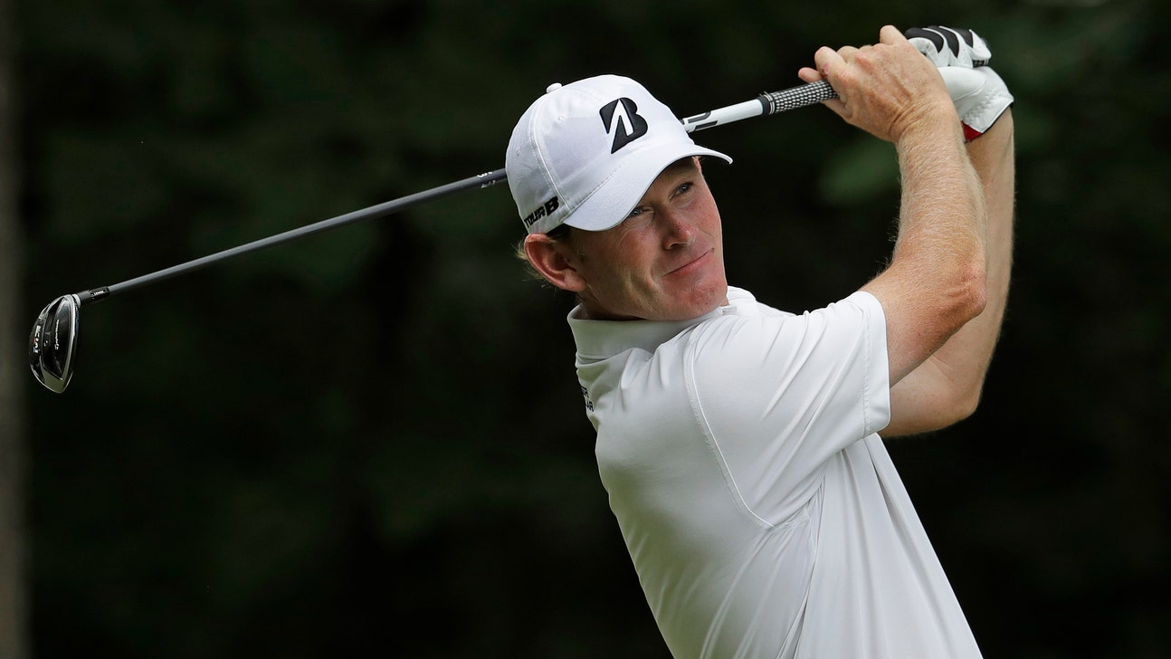 Snedeker leads Wyndham with play held up due to weather