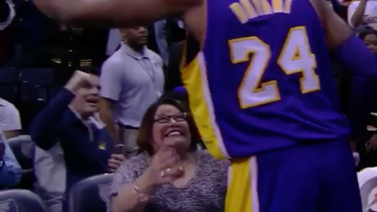 Kobe rejects hug attempt by courtside fan who desperately wanted a squeeze