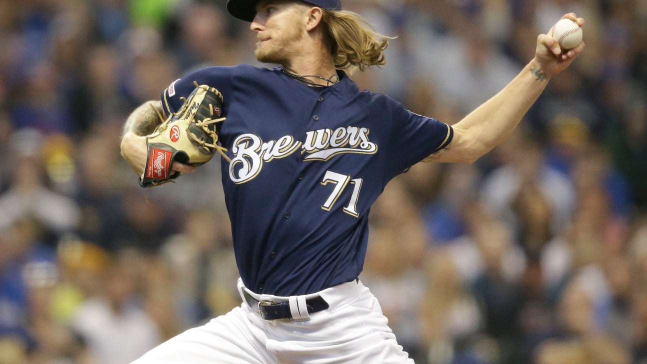 Yelich homers, Hader gets 8 outs, Brewers beat slumping Cubs