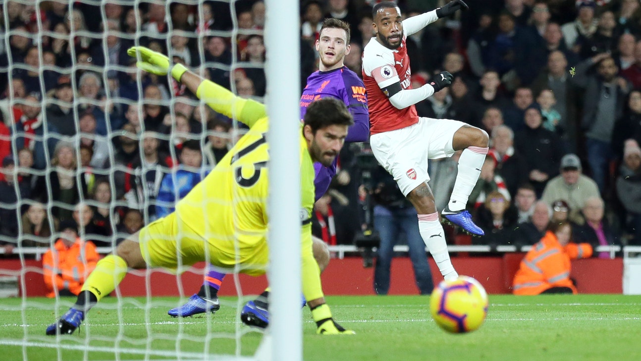 Milner milestone in vain as Arsenal holds Liverpool 1-1