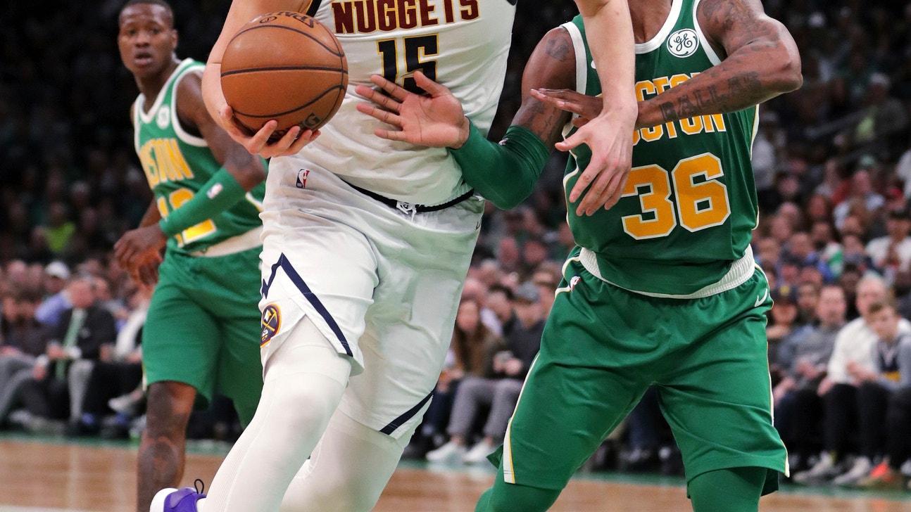 Nuggets clinch playoff spot with win over Celtics