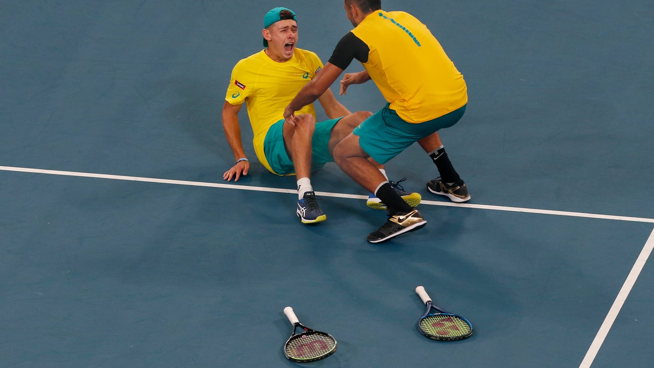 Heated Medvedev wins QF for Russia; Australia beats Britain