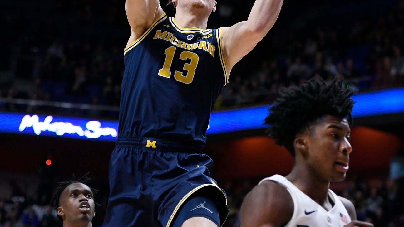 The Latest: Michigan beats Providence for Tip-Off title