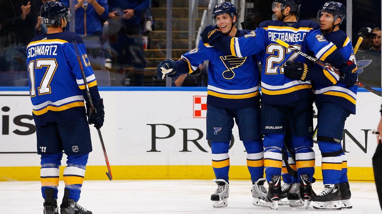 Perron’s hat trick lifts Blues to over Flames 5-3