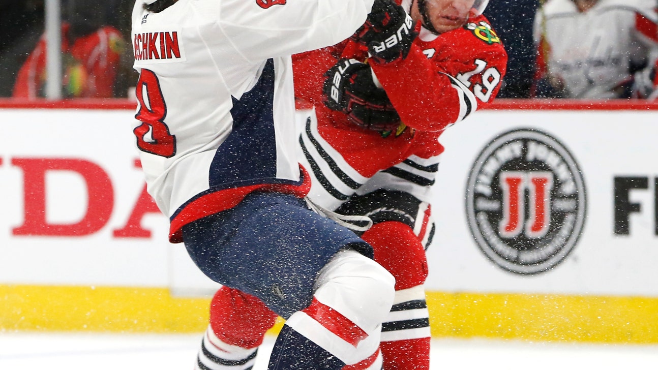 Toews gets hat trick as Blackhawks beat slumping Caps 8-5