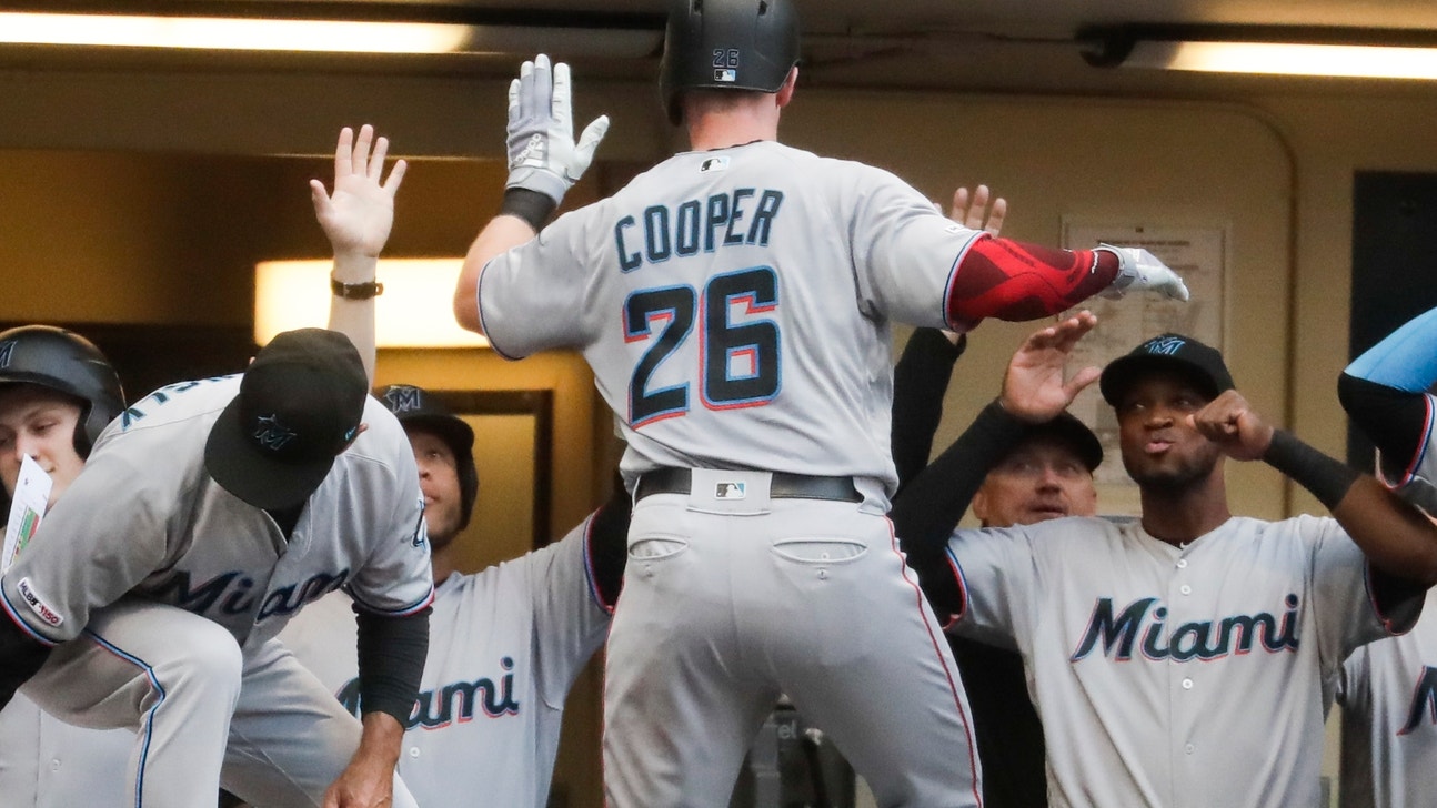 Marlins use 11-run inning to pound Brewers 16-0