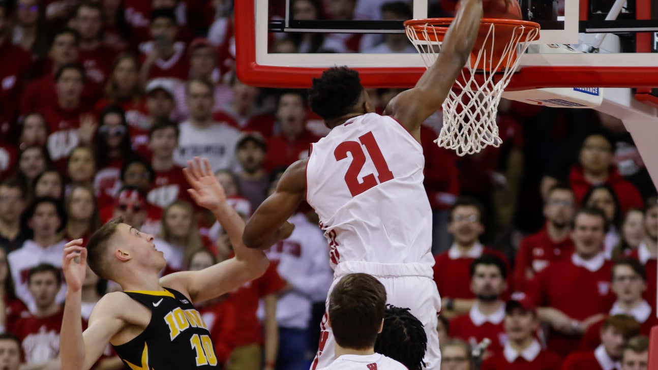 No. 21 Wisconsin routs Iowa 65-45