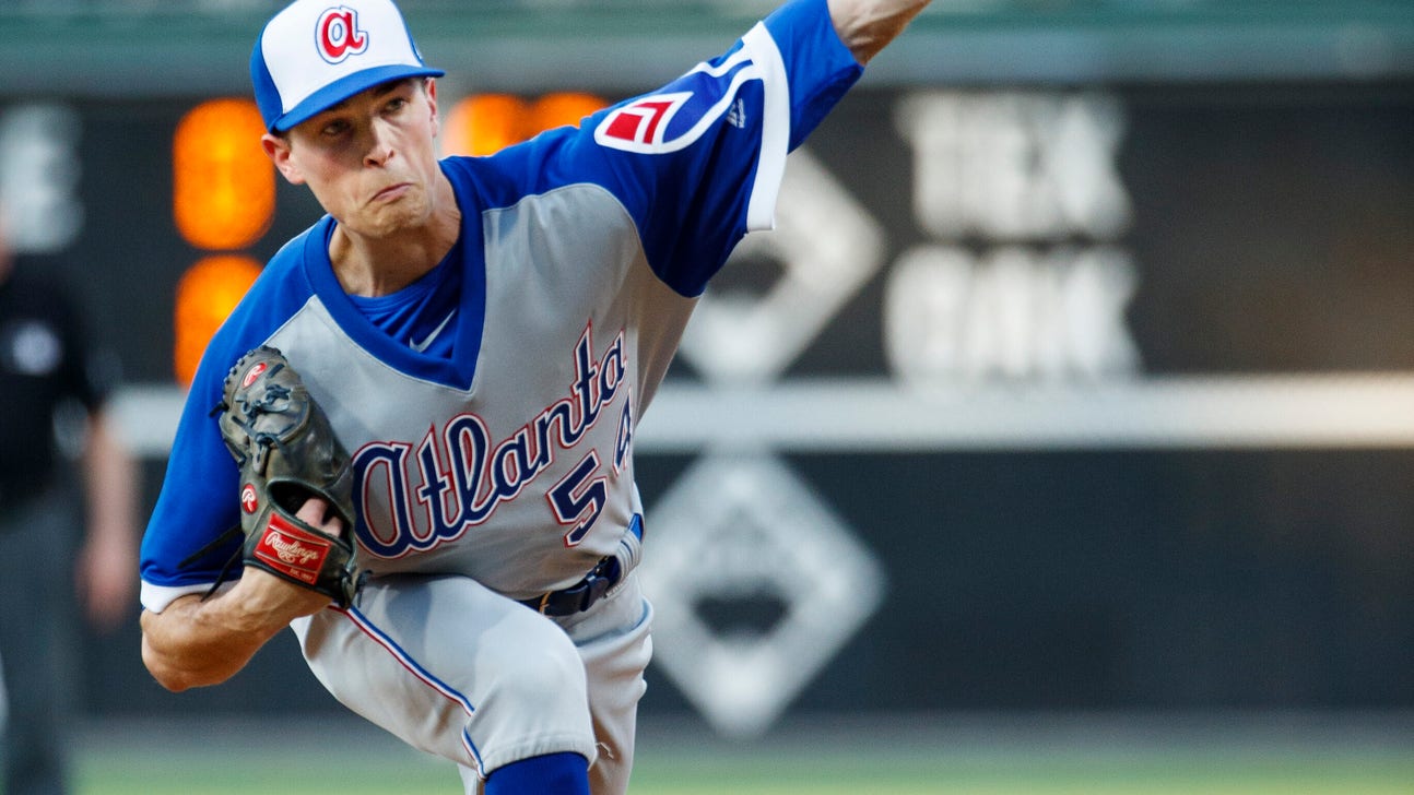 Albies hits slam, Braves rout burgundy-clad Phillies 15-7