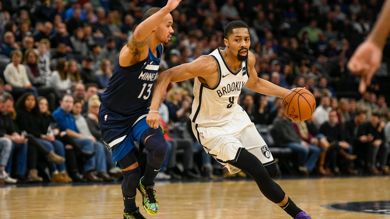 Napier, short-handed Wolves beat Nets 122-115 in OT