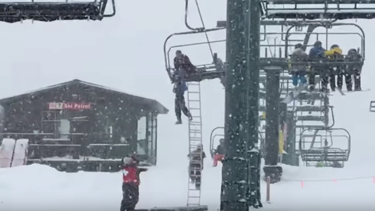Chilling rescue of boy dangling from ski lift caught on tape