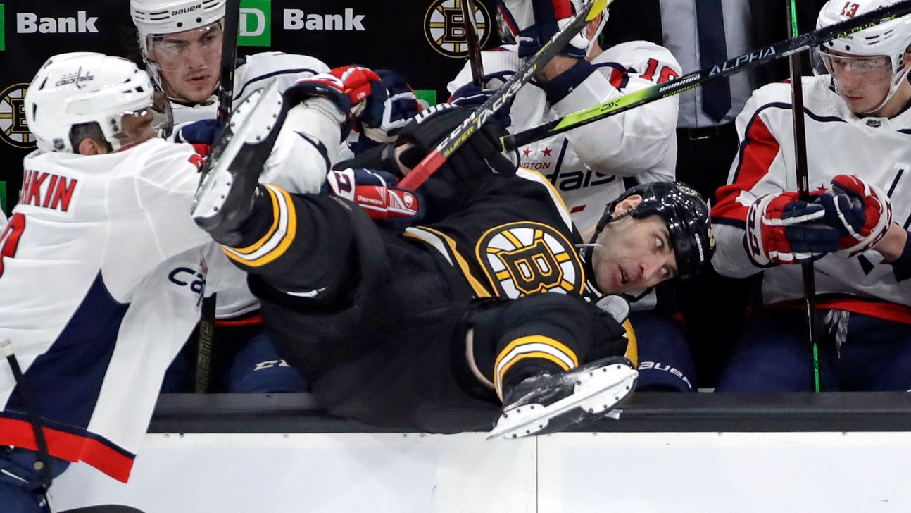 Backstrom helps Caps win 14th straight over Bruins, 4-2