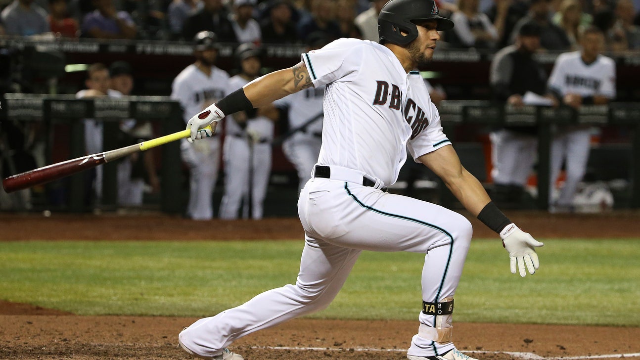 Diamondbacks OF Peralta leaves game with tightness in back
