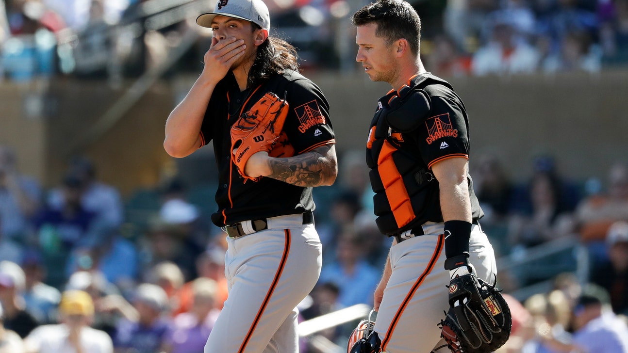 Giants' Posey catching more in spring than expected