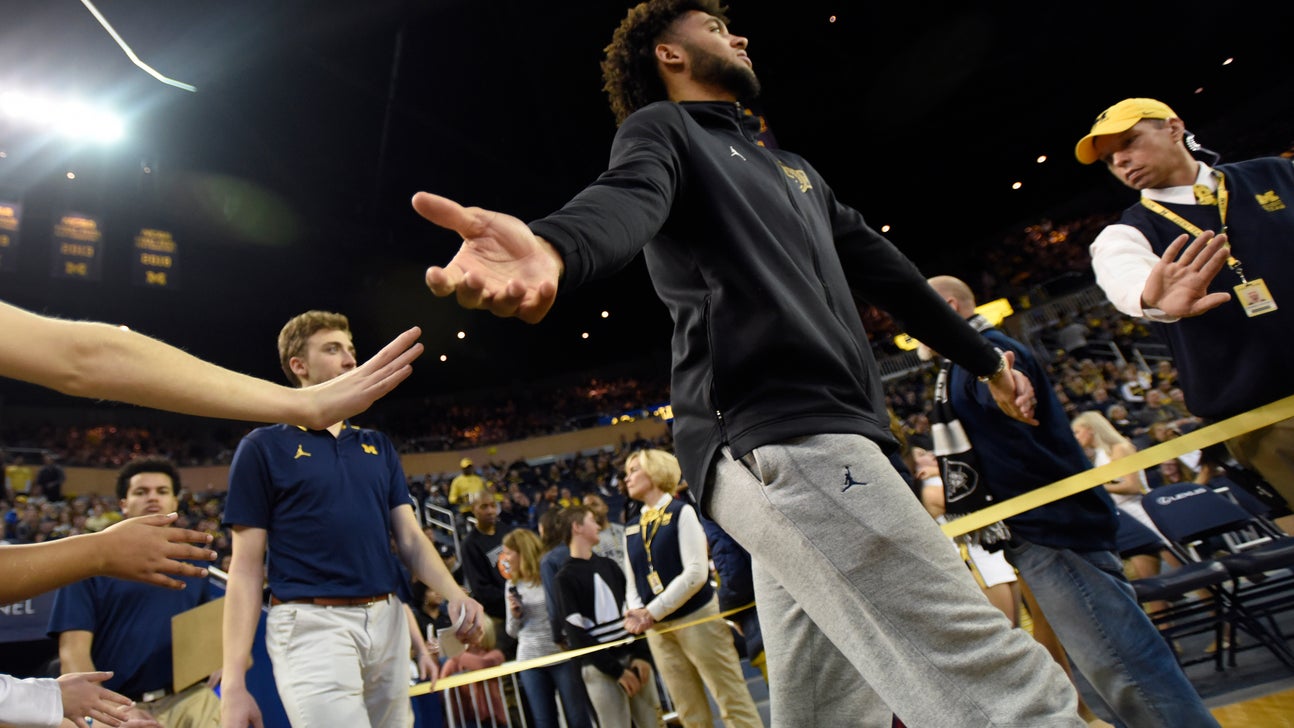 Howard says Livers is day to day for No. 12 Michigan