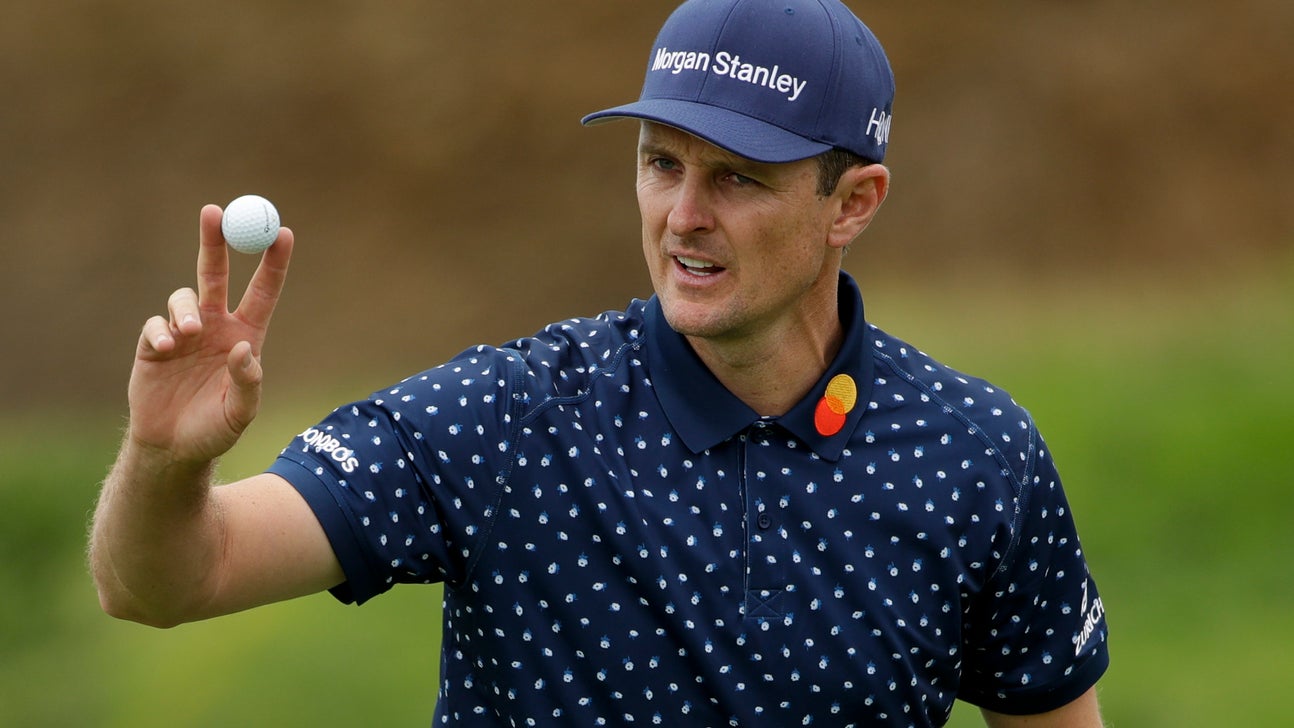 Woodland gouges out a birdie and leads by 2 at US Open