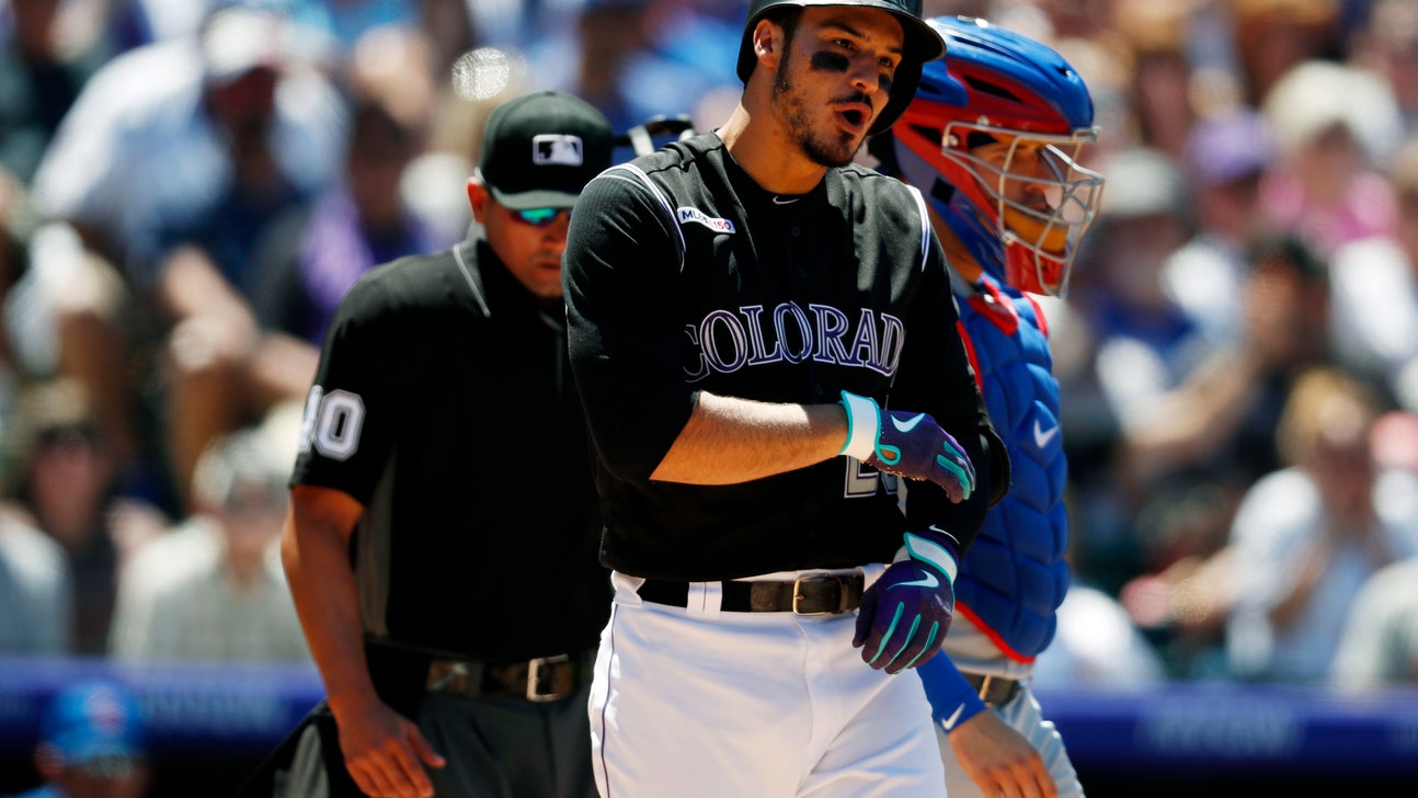 Rockies 3B Arenado hit by pitch on left forearm, leaves game