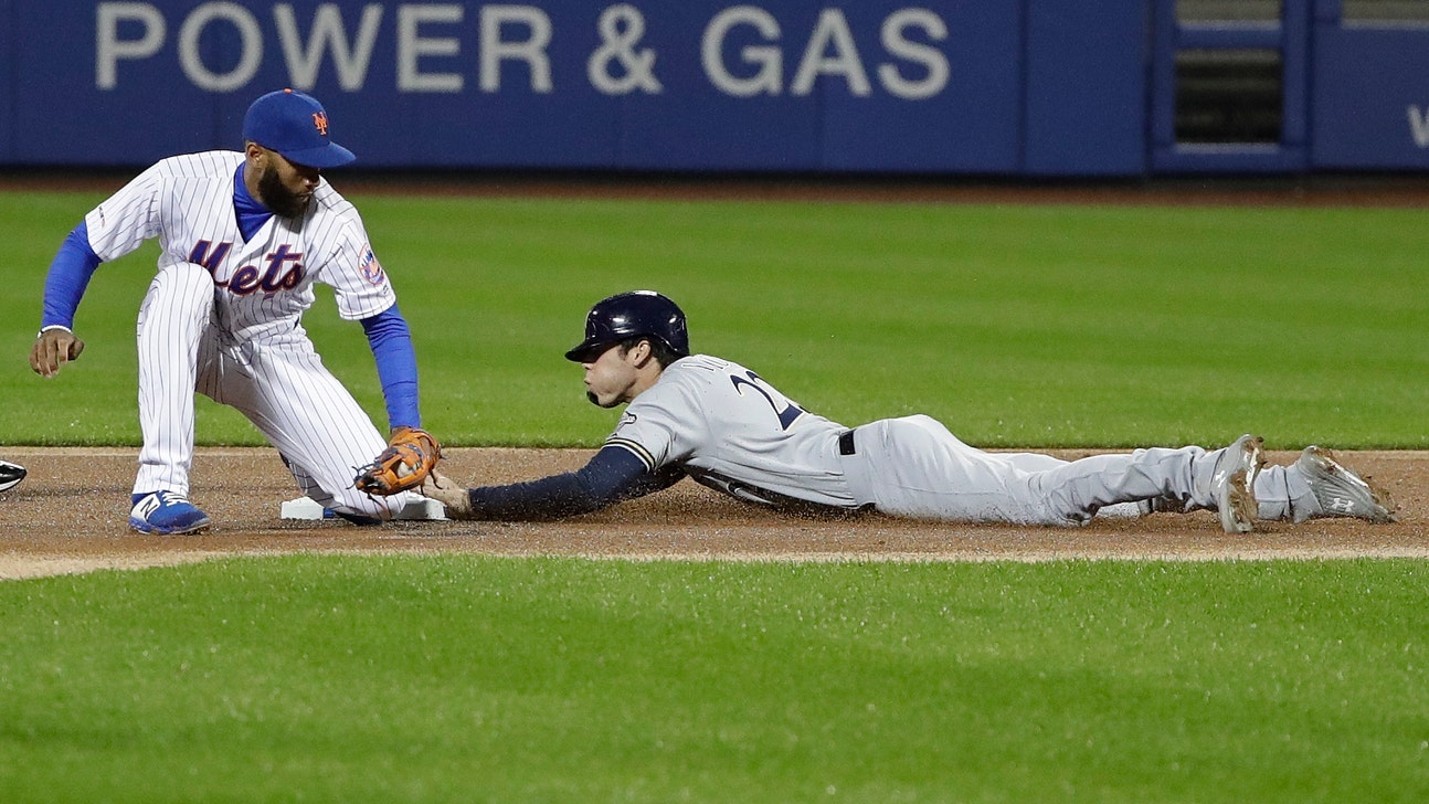 NL MVP Yelich out of lineup with lower back stiffness
