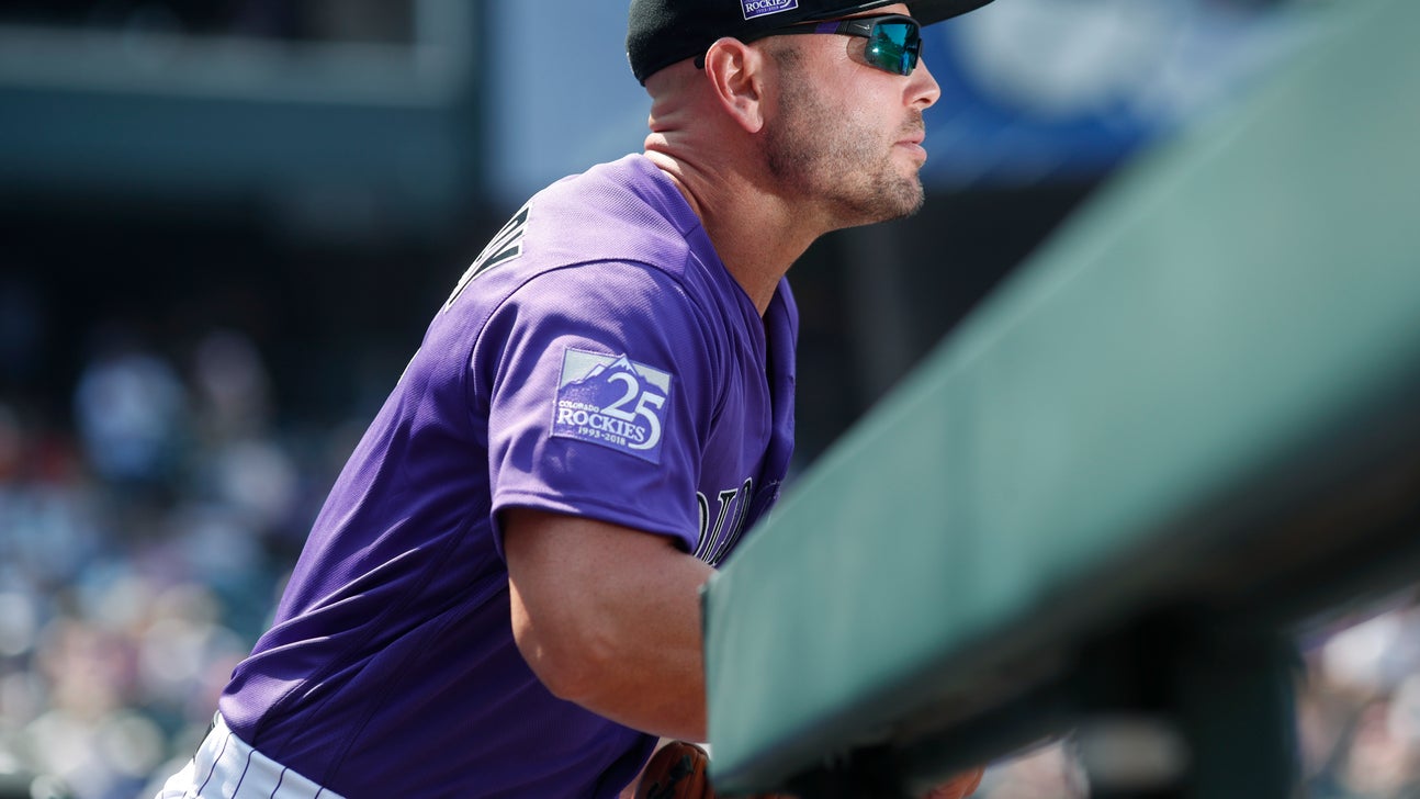 LEADING OFF: Holliday rejoins Rockies, Moreland hurts knee