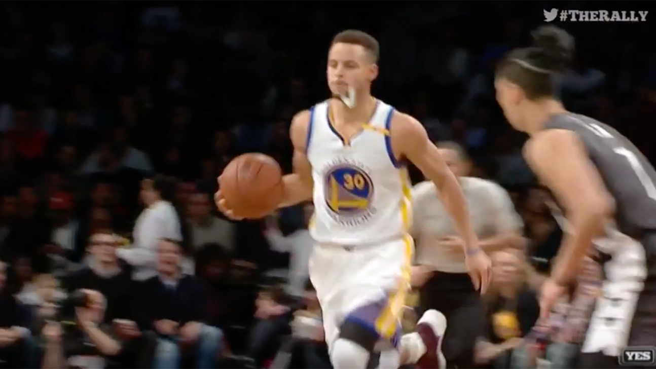 Steph Curry spits out mouthguard to successfully fake out defender for assist