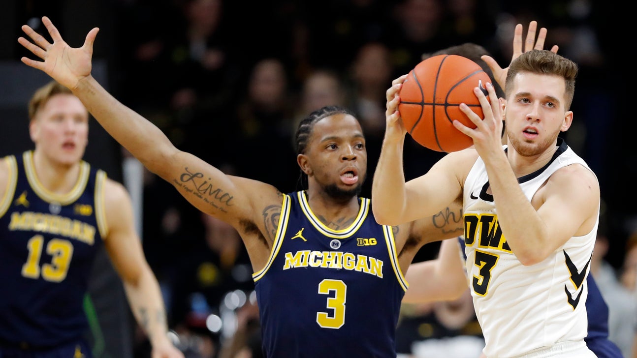 Iowa uses balanced scoring to top No. 5 Michigan 74-59
