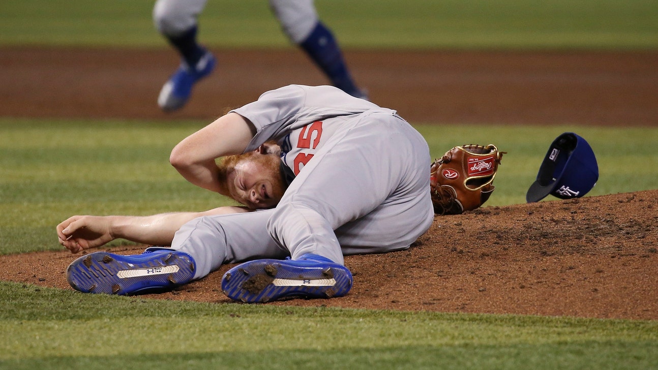 Dodgers' May struck in head by line drive, leaves game