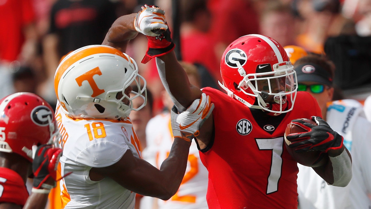 Swift runs for 2 TDs as No. 2 Georgia tops Tennessee, 38-12