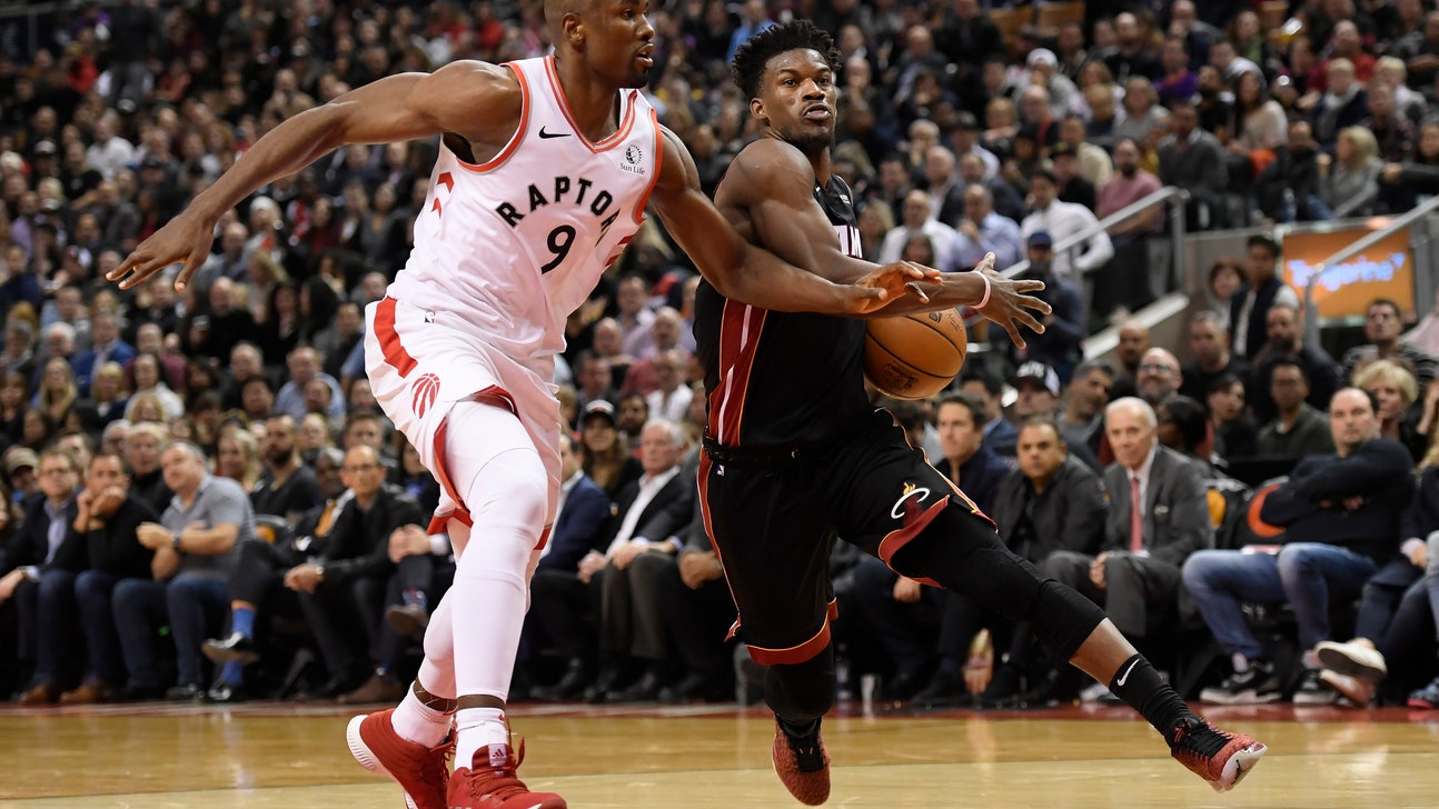 Butler has triple-double, Heat beat Raptors 121-110 in OT