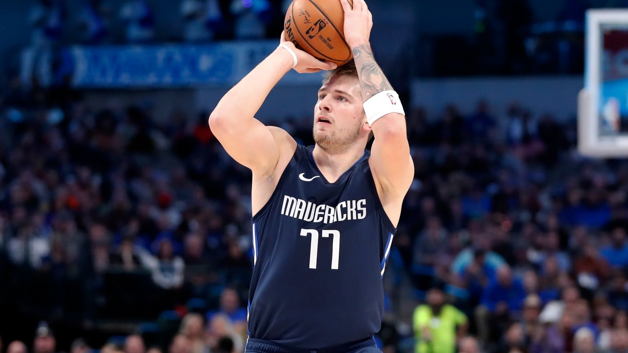 Doncic rolls with Nowitzki watching, Mavs rout Cavs 143-101