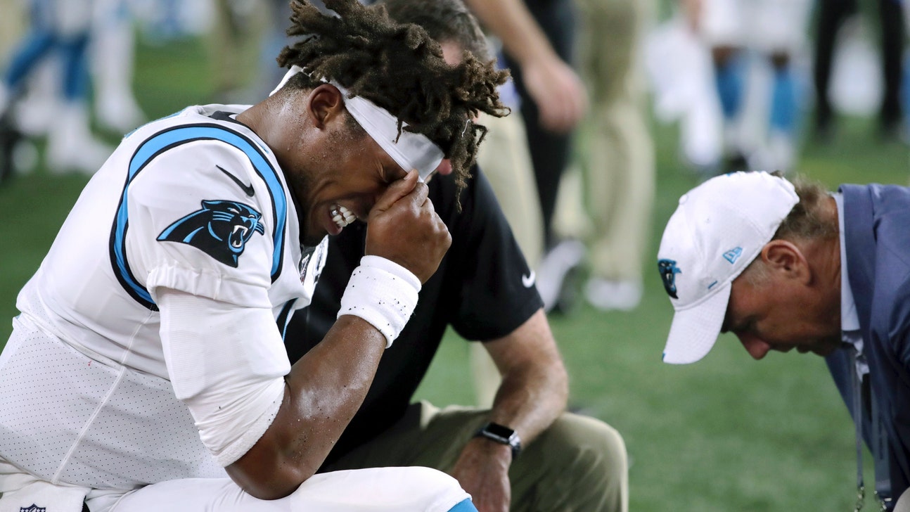 Panthers' Cam Newton remains in walking boot, gets treatment