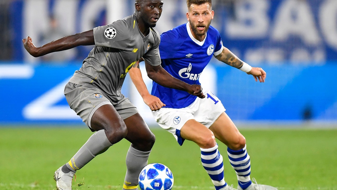 Porto earns 1-1 draw at Schalke in Champions League opener