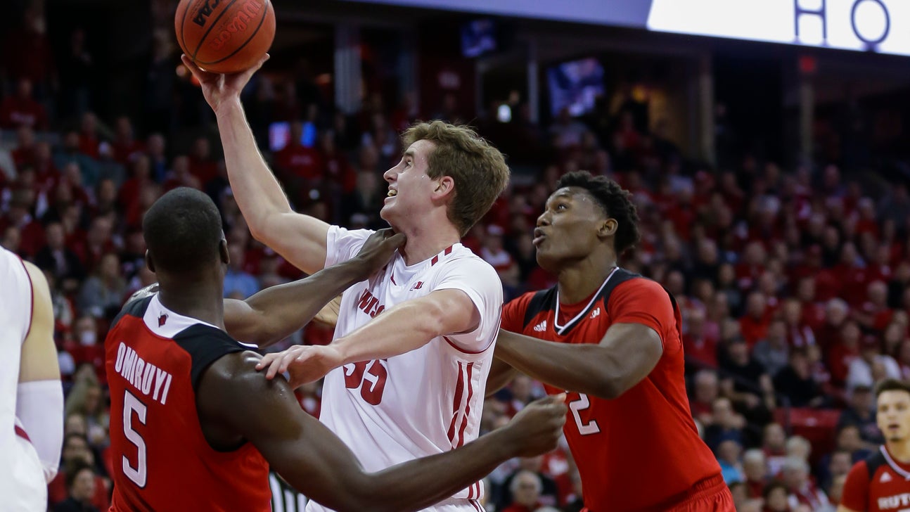 Happ scores 20, rallies No. 12 Badgers past Rutgers 69-64