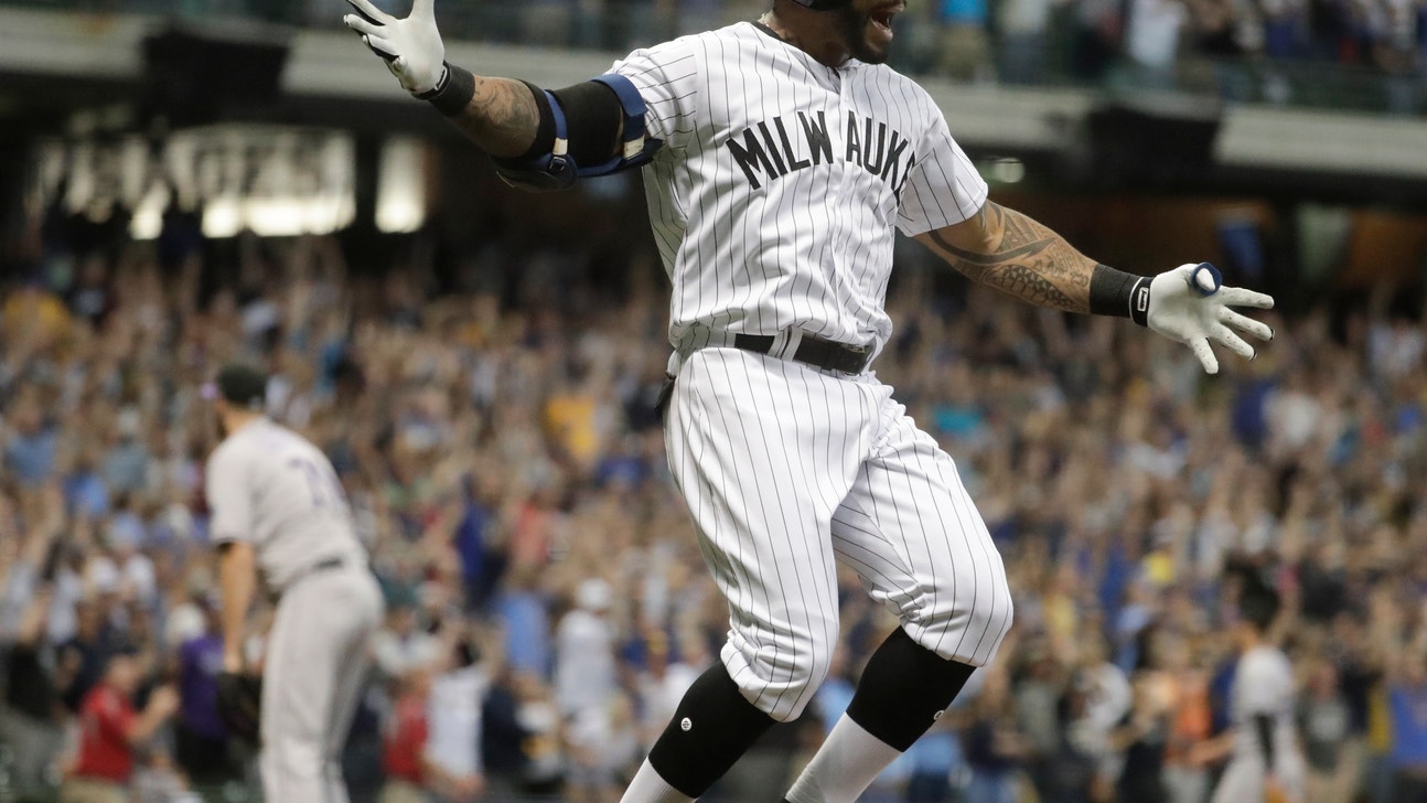 Thames hits walk-off homer, Brewers top Davis and Rockies