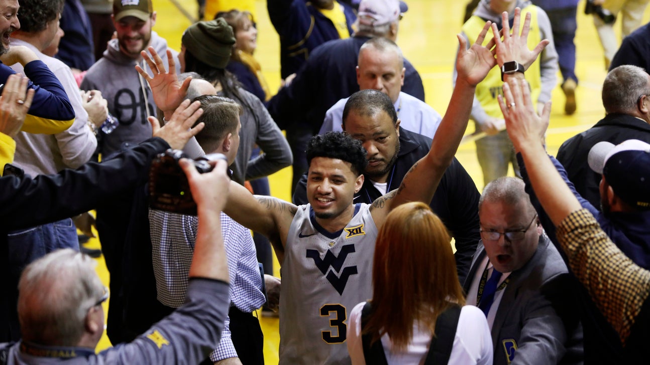Haley’s layup lifts West Virginia over No. 7 Kansas 65-64
