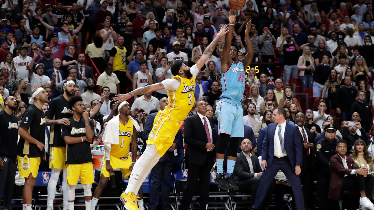 James' caps busy weekend with 32 as Lakers beat Hawks 101-96