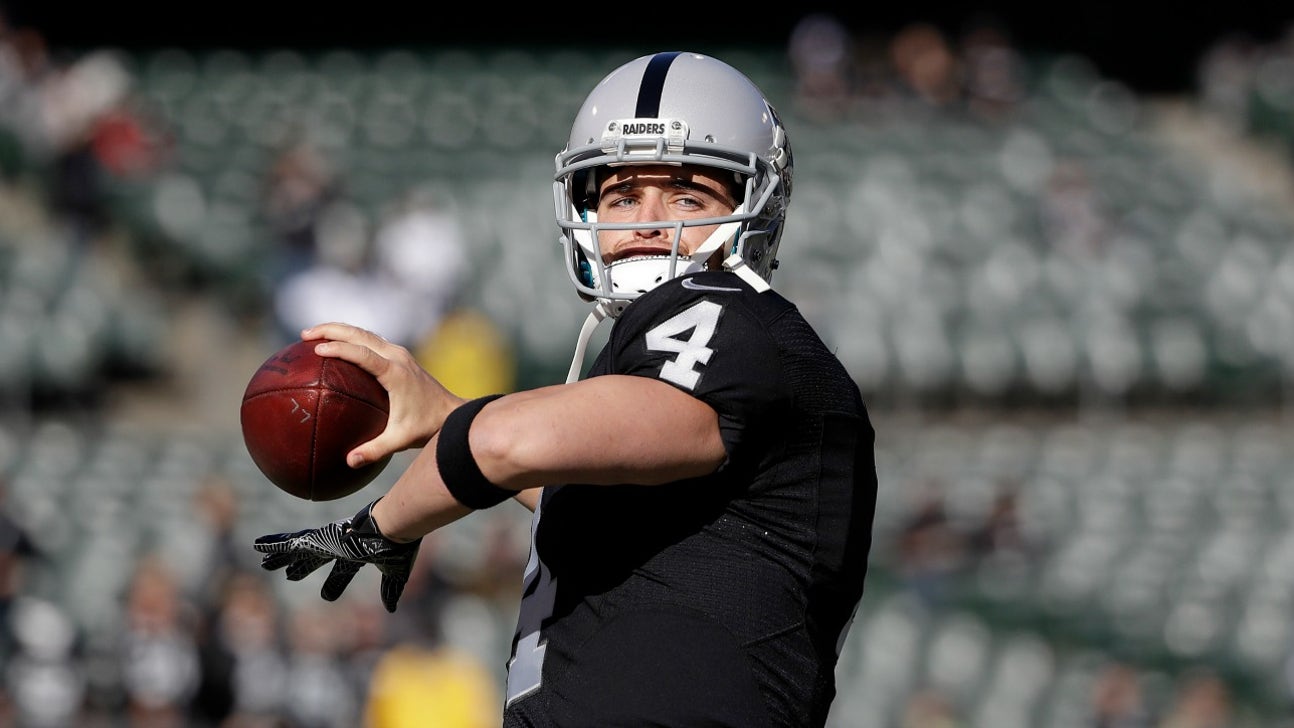 Raiders quarterback Derek Carr helped off field after apparent leg injury