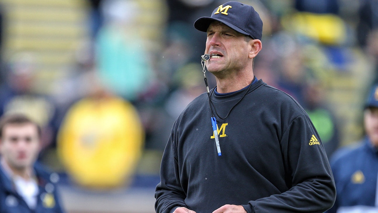 Michigan suspends two from football team