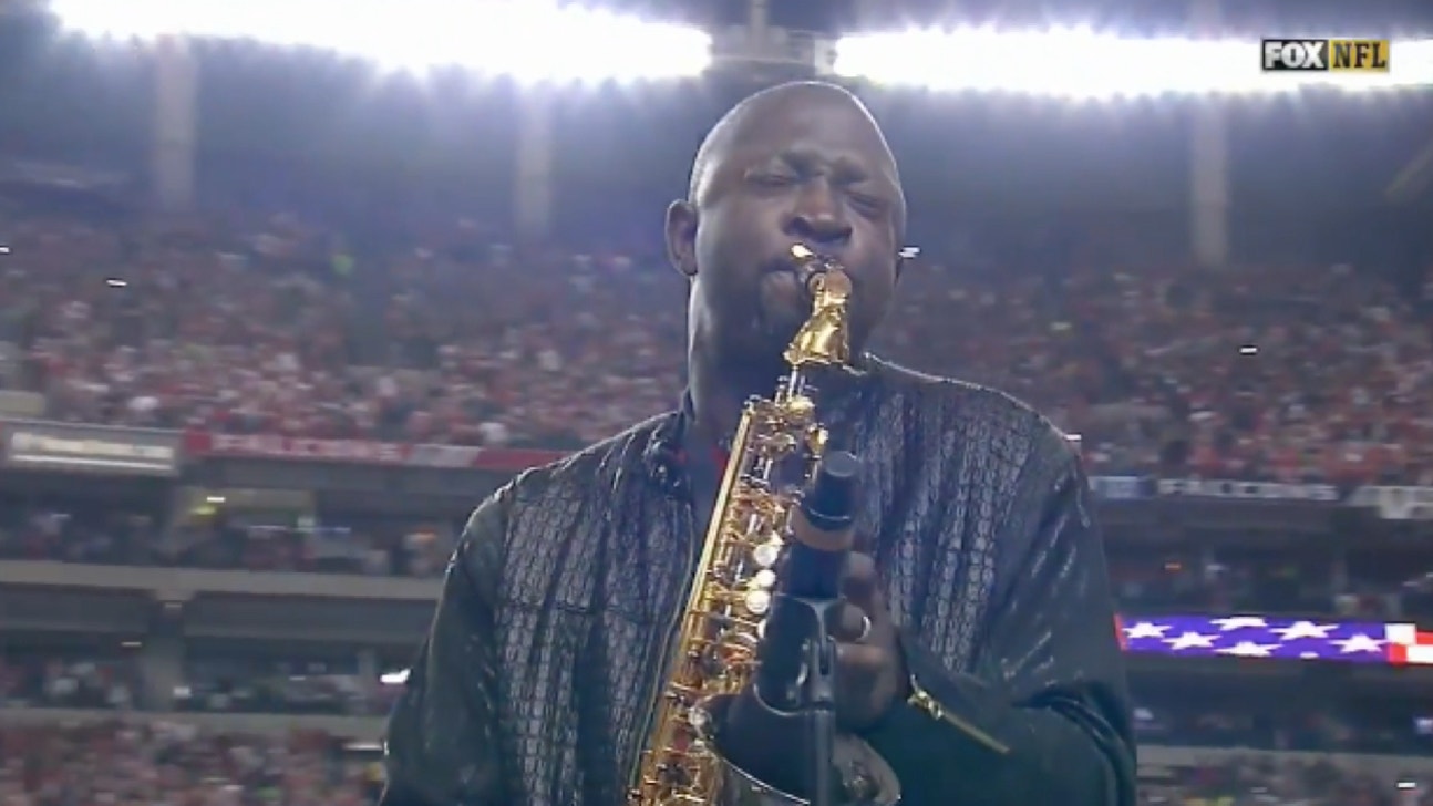 Watch the saxophone national anthem over and over again