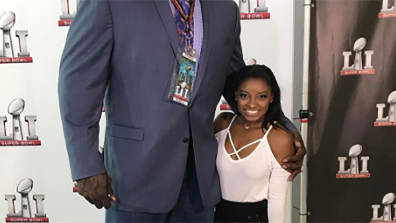 Simone Biles standing next to Shaq is the best Super Bowl Sunday photo