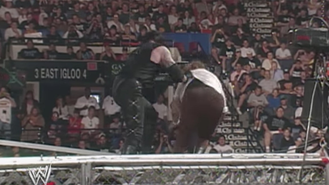 GOOD GOD ALMIGHTY! Undertaker threw Mick Foley off a cage 19 years ago today