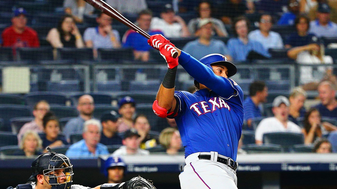 PHOTOS: Rangers cruise past Yankees 12-7 behind Guzman's 3 home run night