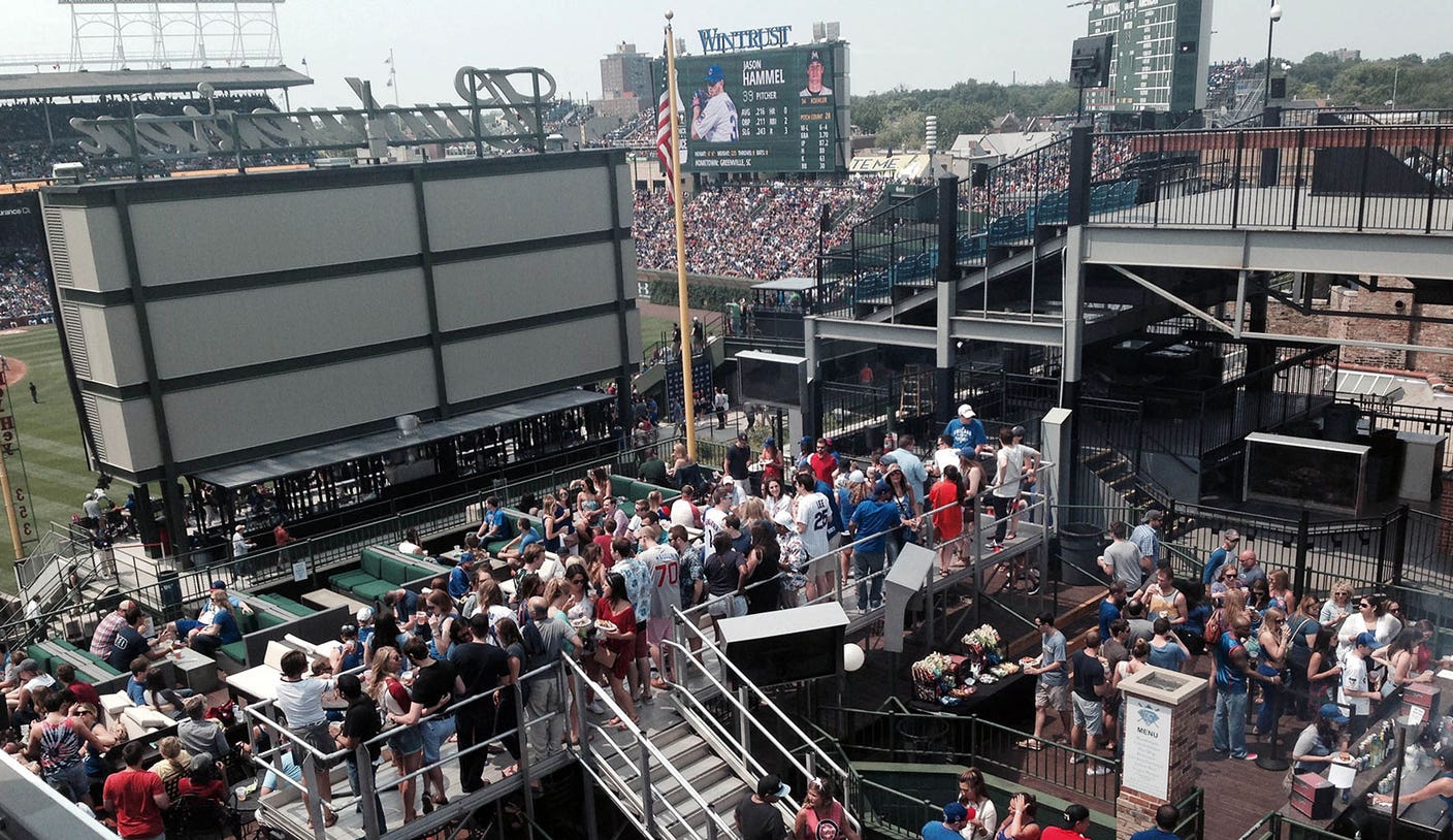 Ricketts buys three more Wrigley rooftops, unveils new ticket site