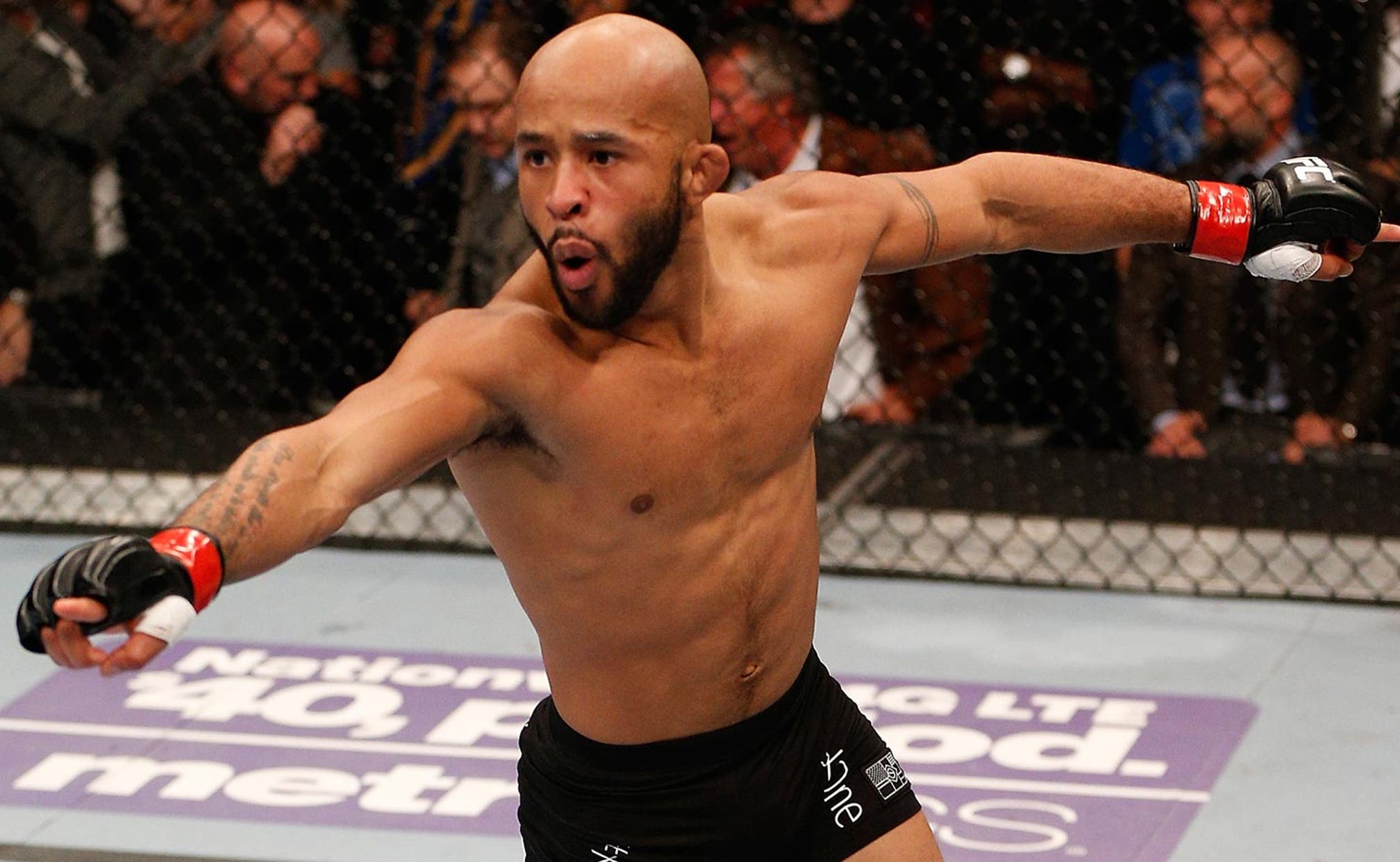 Demetrious Johnson wins at UFC 174 for fourth straight title defense