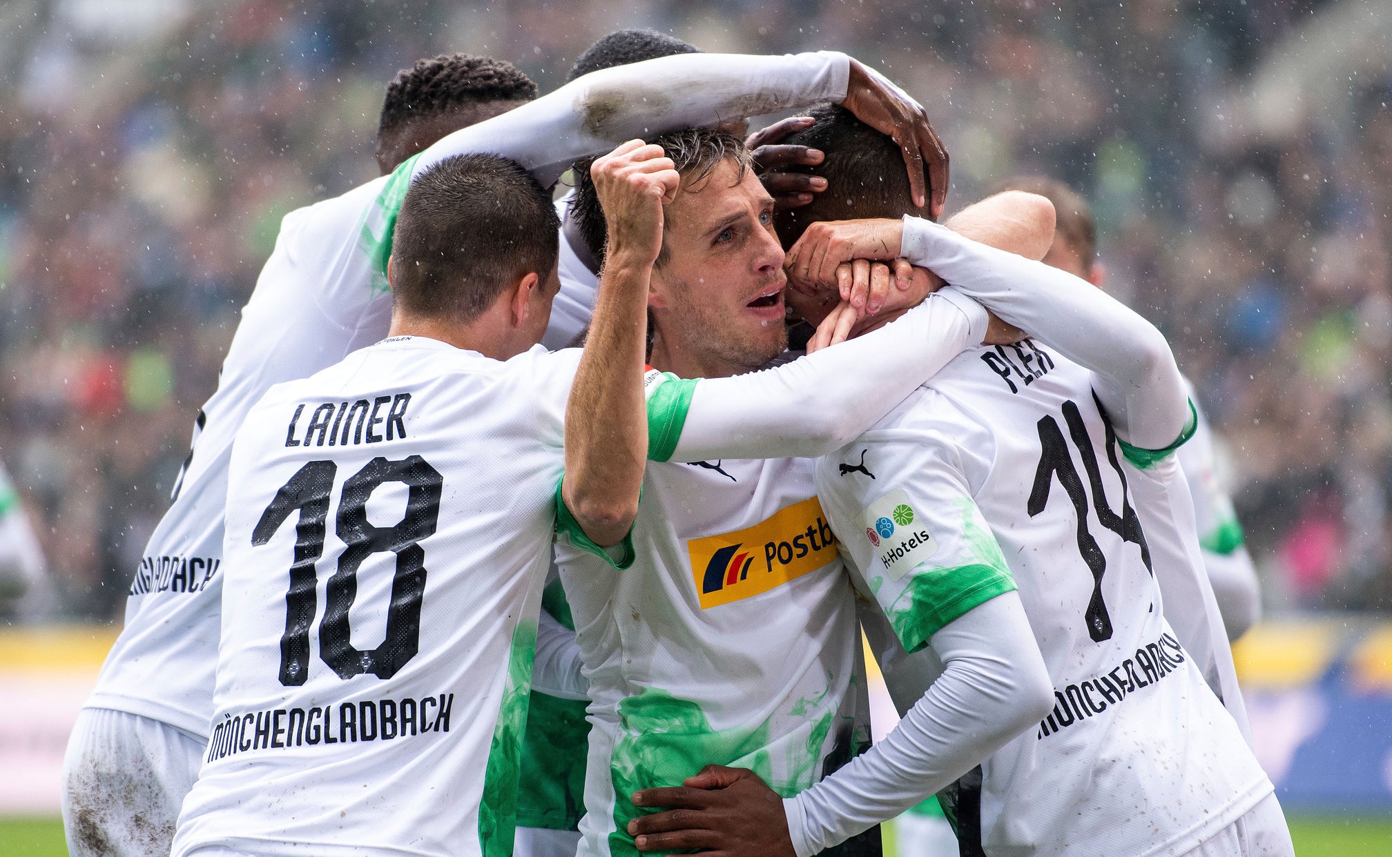 Gladbach routs Augsburg 5-1, moves top of the Bundesliga ...