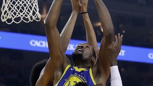 NBA Trending Image: Durant’s double-double lifts Warriors past Nets 116-100