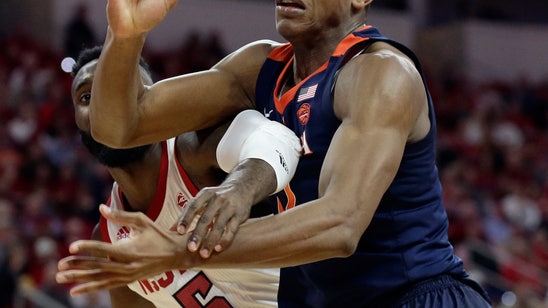 No. 3 Virginia outlasts No. 23 NC State 66-65 in overtime