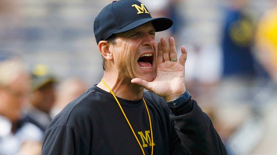 Michigan QB uses Jim Harbaugh photo to troll Houston fan who criticized his transfer