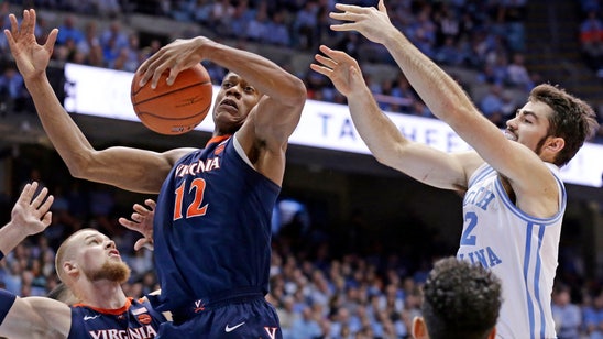 Guy, No. 4 Virginia rally past No. 8 North Carolina 69-61