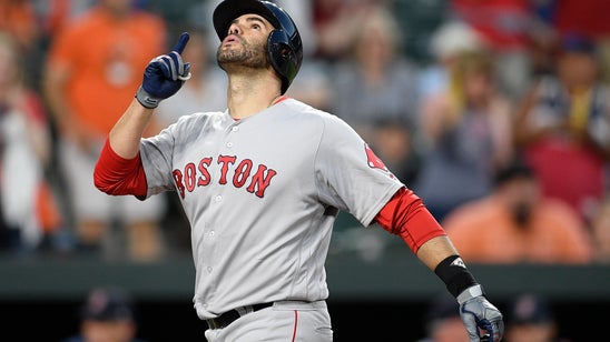 Martinez hits 2 of Boston's 6 HRs in 13-2 rout of Orioles