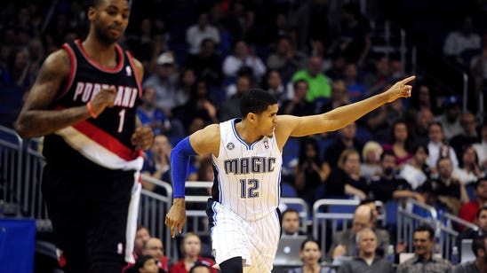 Magic withstand late rally to beat Blazers 102-94