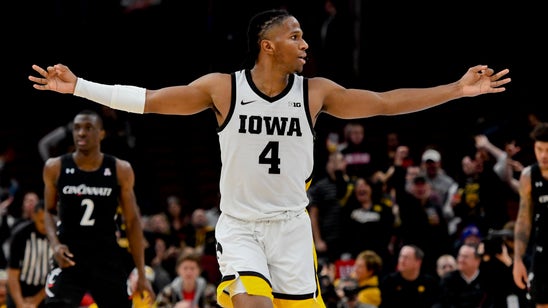 Iowa hangs on for 77-70 victory over Cincinnati